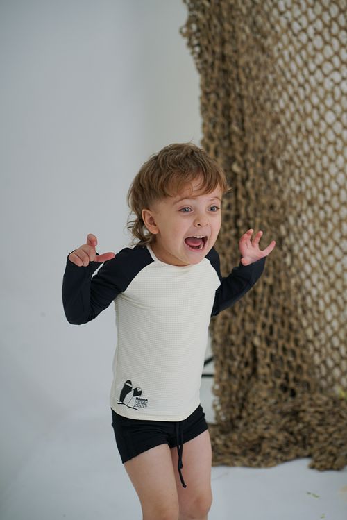 NENE REMERA SURF MANGAS LARGAS BEACH MINICUADRO COMBINADO TRICOT
