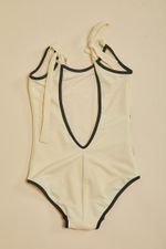 Niña-Entera-Tini-tricot-hueso-con-vivos-negros--1-