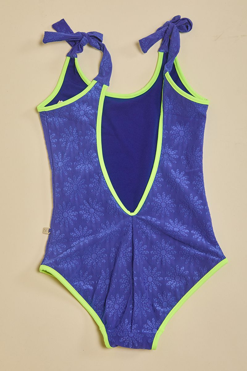 Niña-Entera-Tini-tricot-texturado-azul-con-vivos-amarillos--1-