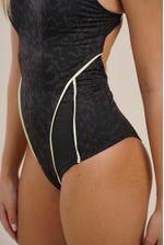 Entera-competicion-MAXIMA-I-ecogreen-dark-spot-negro-verde-marron--1-