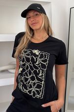 Remera-JAZMIN-jersey-rigido-ivori-flora-negro-y-hueso